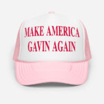 Front of Make America Gavin Again pink foam trucker hat with white front showing printed red word design.