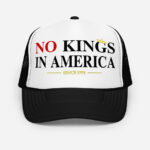 Front of No Kings In America black foam trucker hat with white front showing large script design printed in red and black