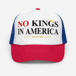 Front of No Kings In America red and blue foam trucker hat with white front showing script design printed in red and black