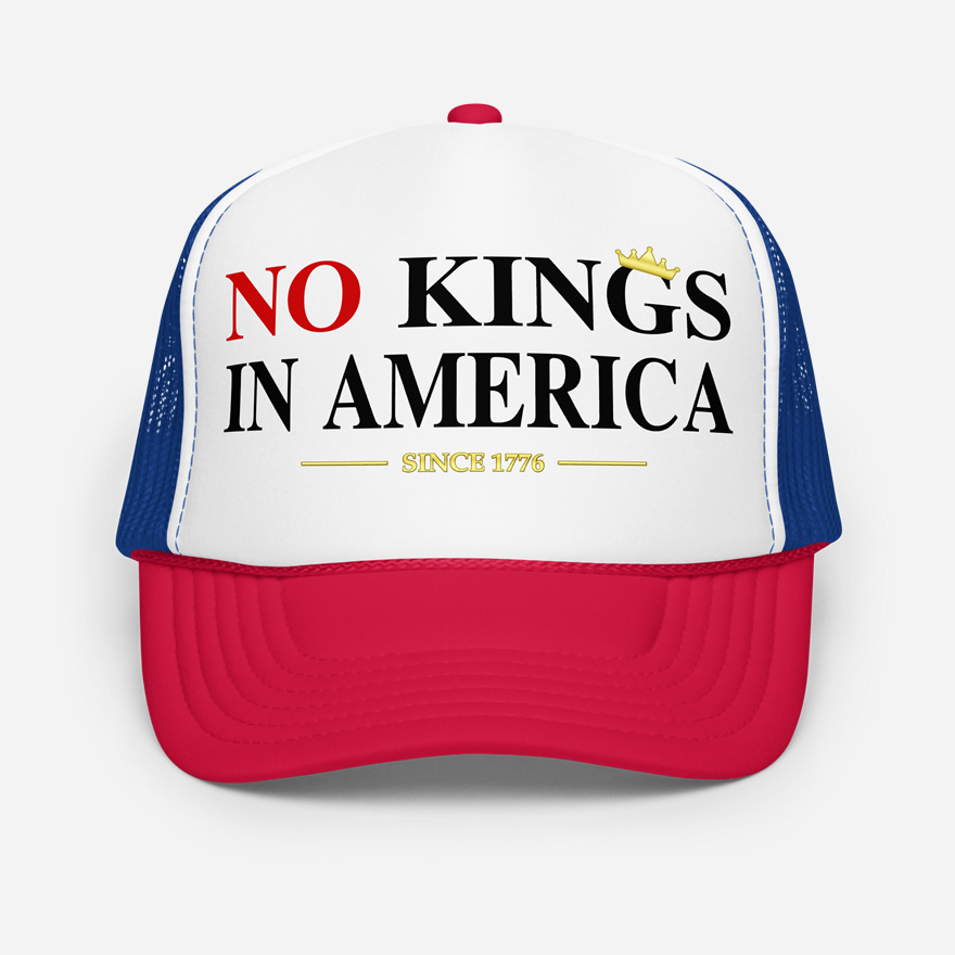 Front of No Kings In America red and blue foam trucker hat with white front showing script design printed in red and black