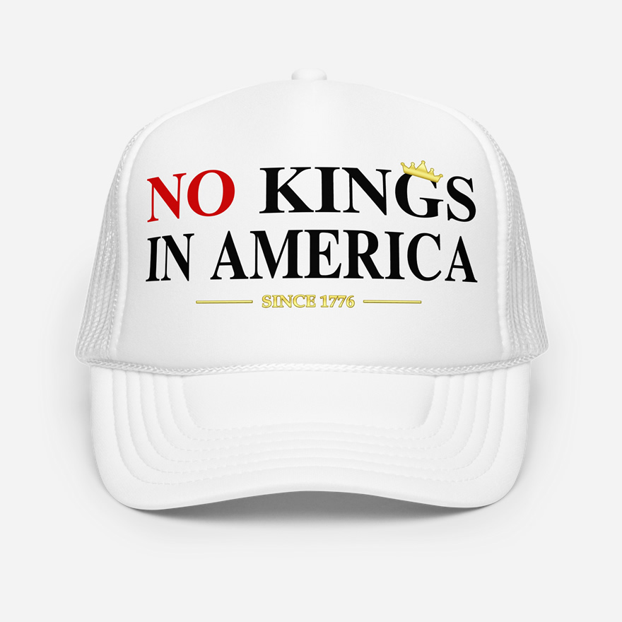 Front of No Kings In America white foam trucker hat showing large script design printed in red and white font.